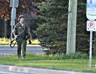 Alleged cop killer arrested in Canada after manhunt