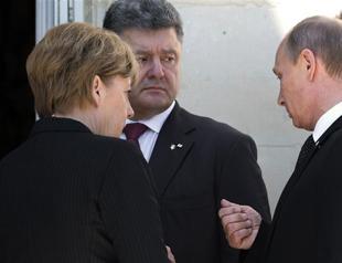 Putin meets Ukraine president-elect before D-Day lunch