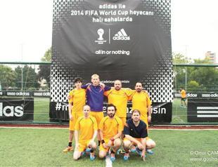 Journalists take on a challenge on the football pitch