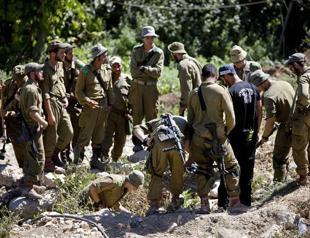 Israeli troops kill 2 West Bankers in teen manhunt