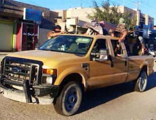 Militants seize more Iraq towns as US presses unity