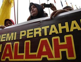 Christians lose divisive bid to use Allah in Malaysia