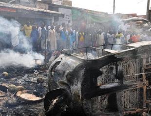 Bomb hits Nigeria market, girls abduction suspect held
