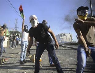 Jerusalem clashes ahead of slain Palestinian teen funeral