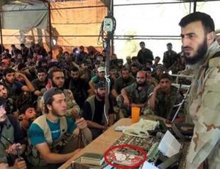 Jihadist leader in Syria addresses militants with Hello Kitty notebook