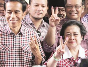 Both sides claim victory in Indonesia election race