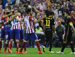 Atletico stun Barca to claim last-four berth