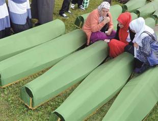 Bosnia marks anniversary of Srebrenica with mass burial