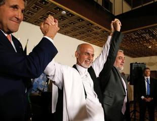 Afghan rivals clinch deal on disputed vote audit, easing political crisis