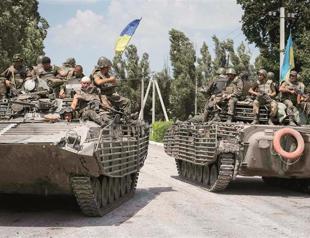 Russia threatens Ukraine after shell crosses border