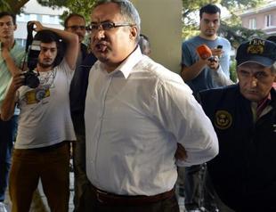 Eleven police officers arrested in wiretapping probe