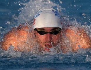Phelps beaten in first final of comeback