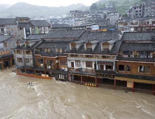 Ancient town under water as downpours hit central China
