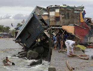 Typhoon kills at least 38 in the Philippines, heads for China