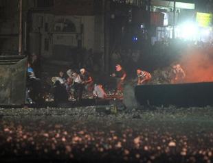 Israel kills Palestinian, dozens injured in West Bank protest