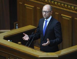 Ukraines PM resigns, complicating MH17 probe