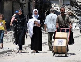 First UN aid convoy enters Syria from Turkey