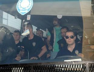 At least eight police officers arrested in wiretapping probe