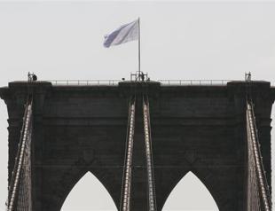 Two German artists claim Brooklyn Bridge flag stunt