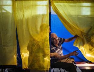Ukraine holds key vote shunned by rebel-held east