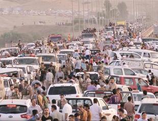 Turkey plans Iraq camp to prevent refugee flow