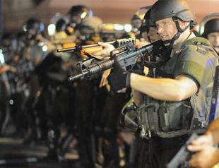 Obama orders review of US police use of military hardware