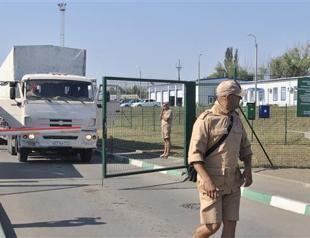 Kyiv says battling armour from Russia as Moscow plans new convoy