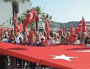 Police chiefs suspended amid flag probe