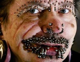 Dubai bars worlds most pierced man: report