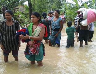 180 dead as floods wash away homes in Nepal, India