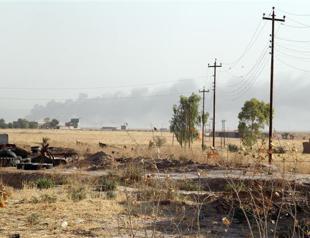 Iraq strikes jihadists as fears grow for thousands in besieged town