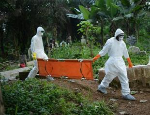 Ebola death toll passes 1,500 as regional crisis talks begin
