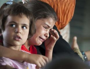 US planes strike militants, drop aid near ethnic Turkmen town