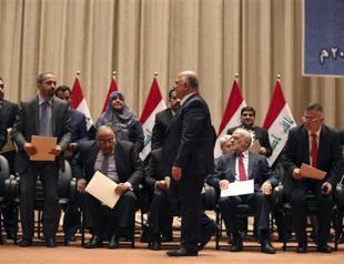 Iraq MPs approve new government, Kerry to visit region