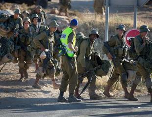 Israeli PM calls Palestinian president, says expects help finding teenagers