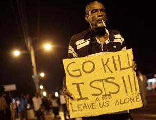 US attorney general visits Missouri town for meetings on fatal shooting