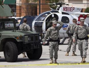 National Guard begins pullout from riot-weary Ferguson