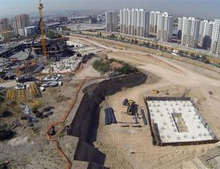 Lone house stands in gigantic construction site in Ankara