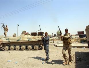 Iraqi forces press advance as parliament stormed