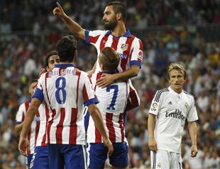 Arda Turan wins Madrid derby for Atletico