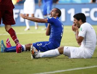 FIFA probing Suarez bite furore, lengthy ban seen