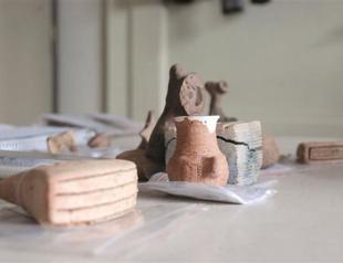 Ancient brush and rattle discovered