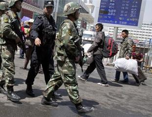 China says 40 rioters killed in restive Xinjiang
