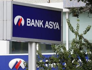 Bank Asya shares firm despite two suspensions in morning session