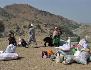 Up to 100 Afghans killed, 12 beheaded, in Taliban offensive