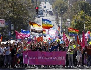 Behind wall of police, Serbia hosts first Gay Pride since 2010