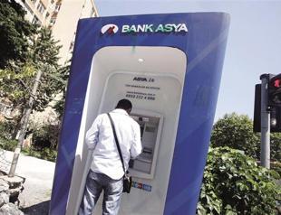 Bank Asya moves to save capital as president calls on watchdog to intervene