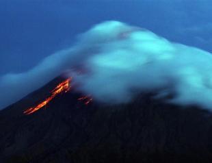Rushed evacuations as Philippine volcano spews lava