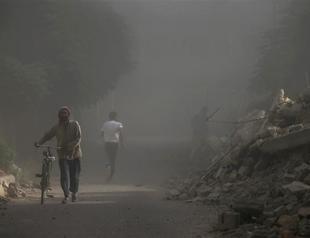 Syria air strikes kill dozens in rebel town: monitor