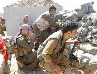 Backed by strikes, Kurds battle for key Syria town